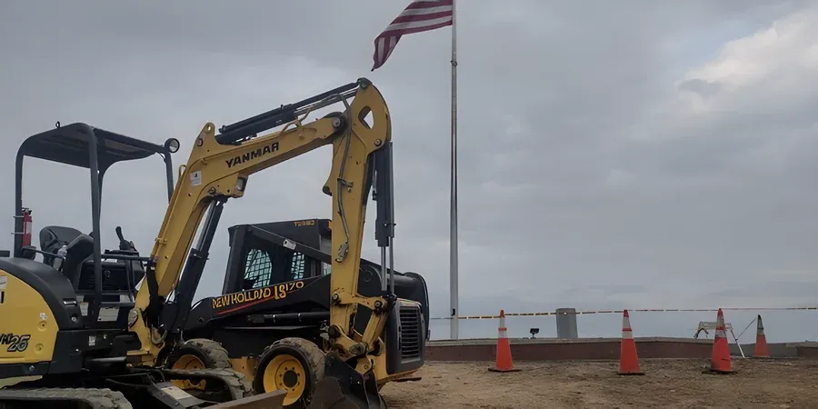 Yanmar compact excavator and New Holland skid steer